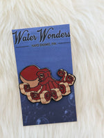 Octopus pin on an artistic backer card