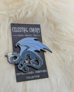 Blue dragon pin on decorative backer card