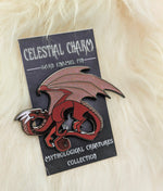 Red dragon pin on decorative backer card