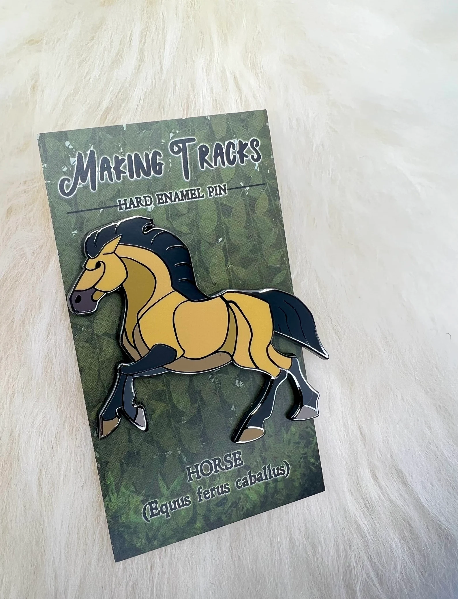 Buckskin horse pin on artistic backer card