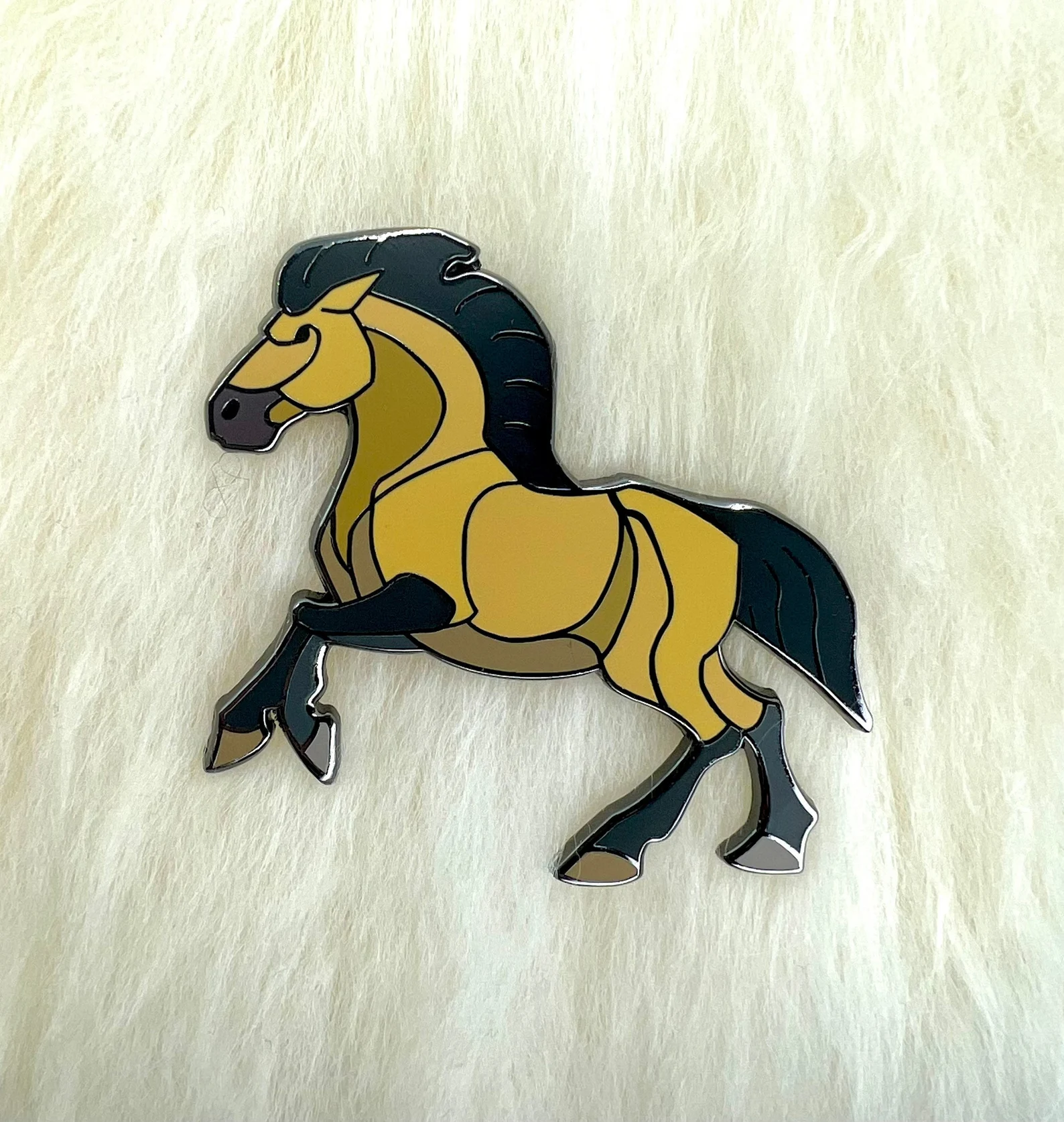 Buckskin horse pin on lambskin